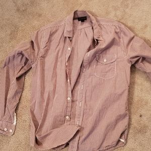 Barley worn brown and white shirt